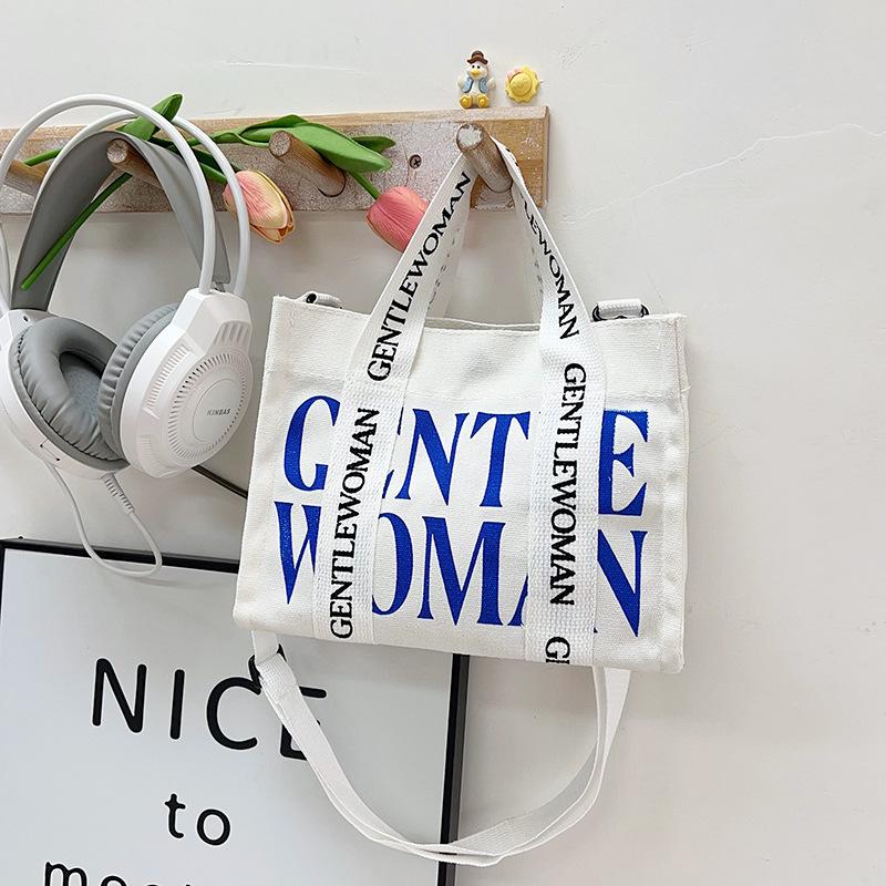 

Canvas bag women s bag handbag new small square bag fashion contrasting color shoulder bag messenger bag small square bag синий