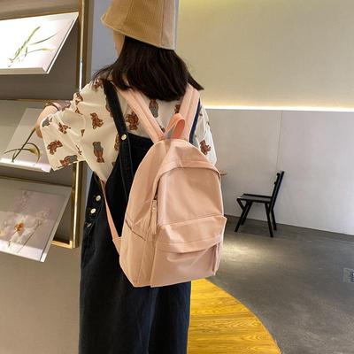 Women's High School Backpack - Wear-resistant, Solid Color, Casual Travel Bag for Girls and Women.