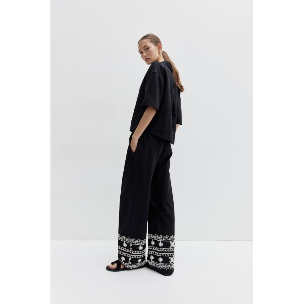 

Брюки с вышивкой HM черные кремовые