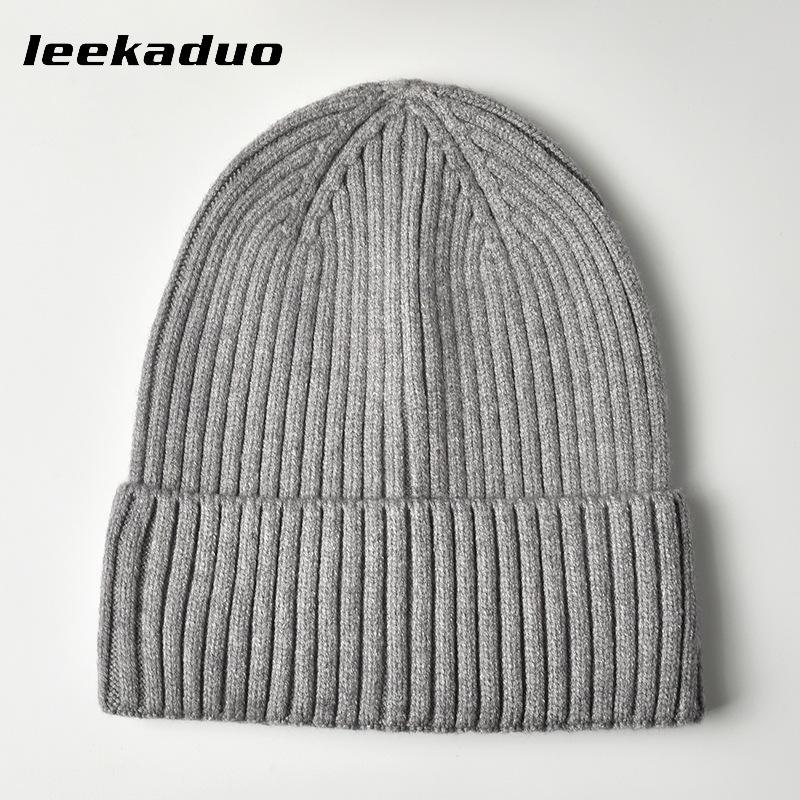 Simple solid color hat Men's winter light board cover Knitted hat Wool hat Autumn and winter warm ear protector Cold hat