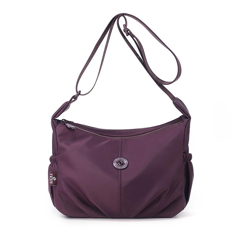 Elegant Slouch Shoulder Bag with Top Zip Closure Adjustable Strap Geometric Stitching and Smooth Nylon Fabric for Modern Daily Wear and Commuting