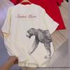 Camiseta de algodón de manga corta holgada con estampado de leopardo: un estilo urbano moderno, fresco y a la moda.
