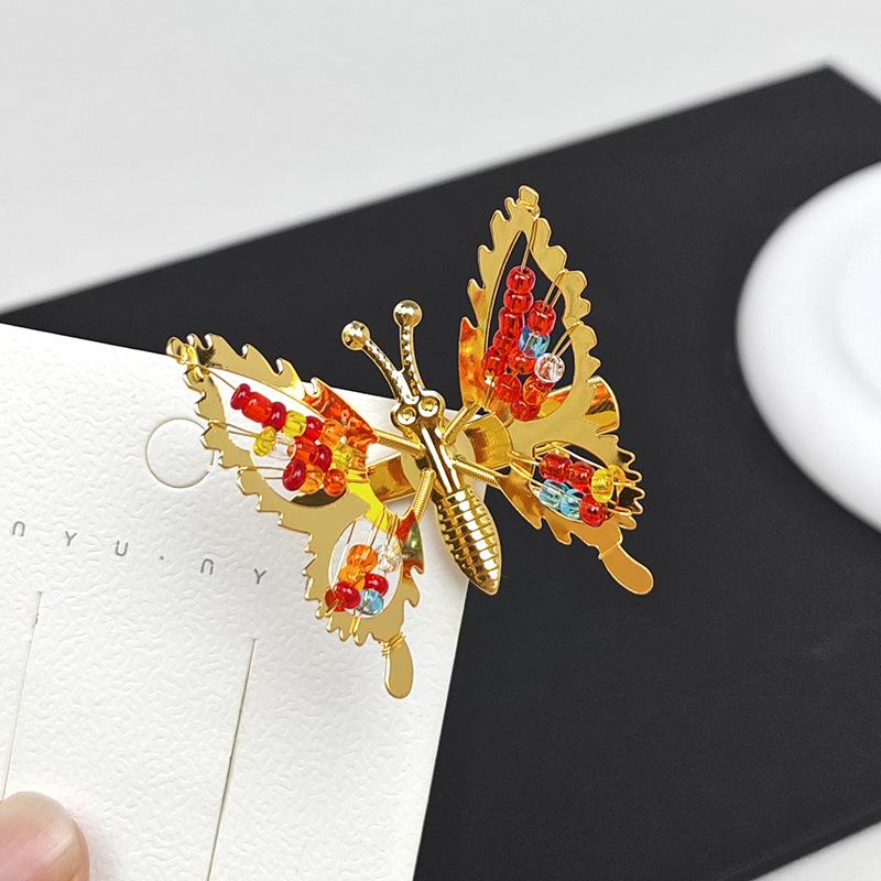 Vintage Schmetterlings-Quasten-Haarspange: Damen Perlen Haaraccessoire im antiken Stil für Pony und Seitenclips.