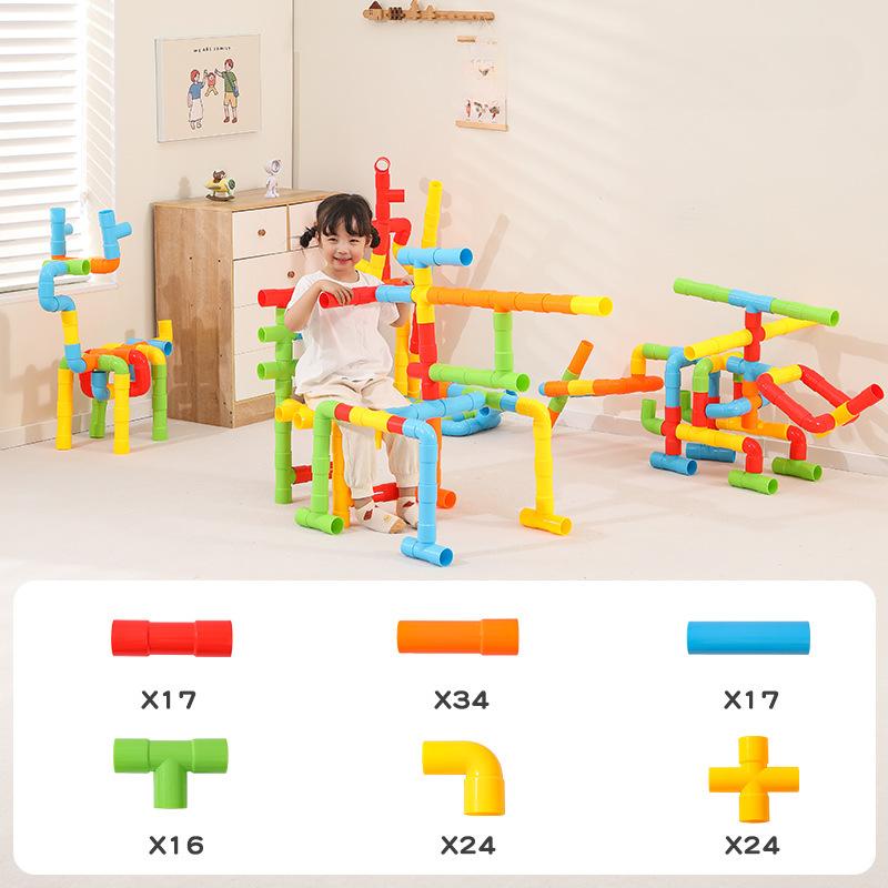 

Многофункциональные большие строительные блоки для водопроводных труб собираются и вставляются для создания труб-головоломок из крупных частиц