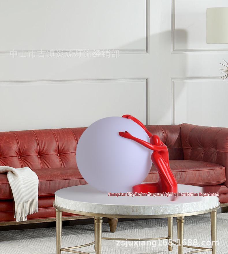 Modern Nordic Table Lamp Sculpture: Creative Doll Holding Luminous Ball for Bedroom and Living Room Decor