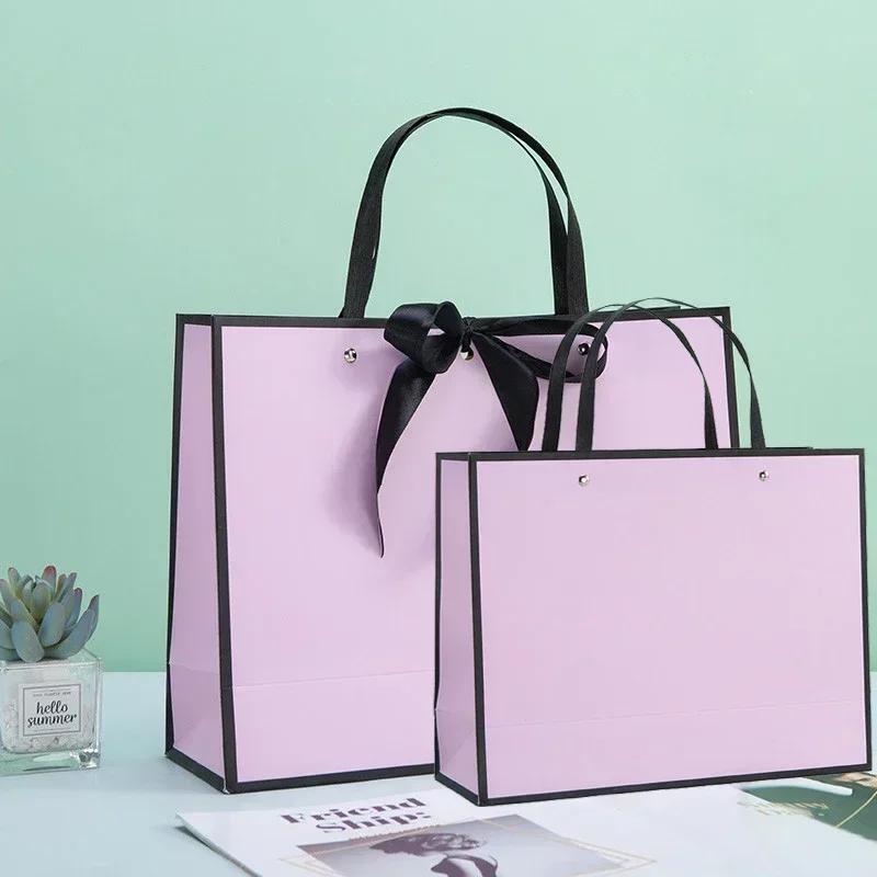 White Paper Jam Handbag Kraft Paper Thick Waterproof Frame Rivet Handle Gift Bag Cosmetic Clothing Store Portable Packaging Bags