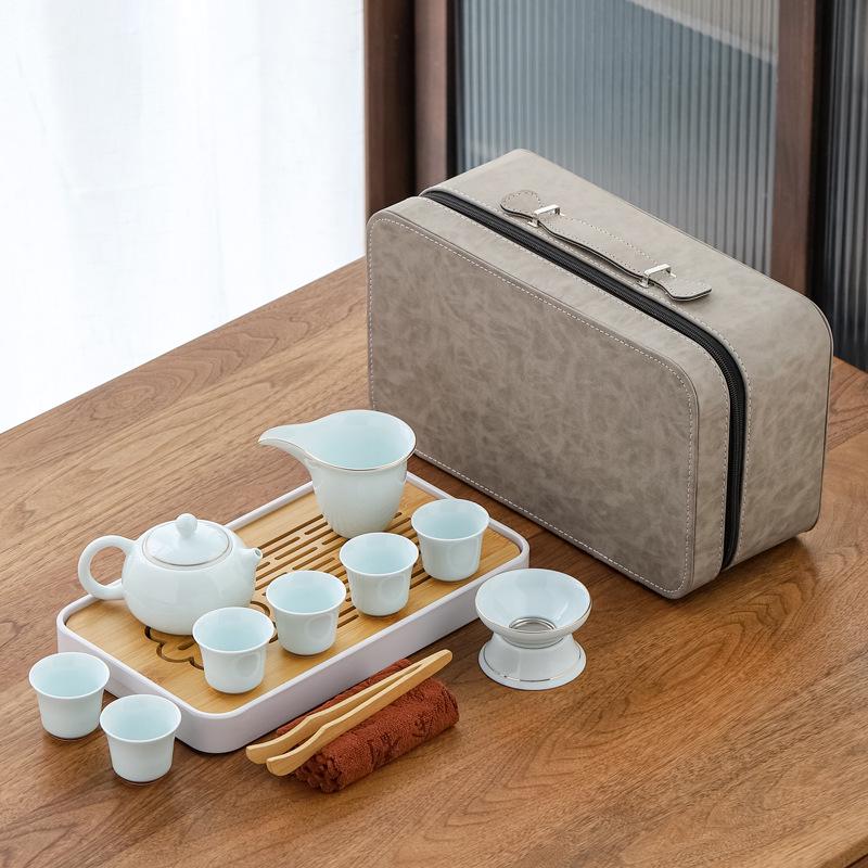 Jade Green Travel Tea Set: One Pot, Four Cups, with Wooden Side Handle and Tea Caddy.