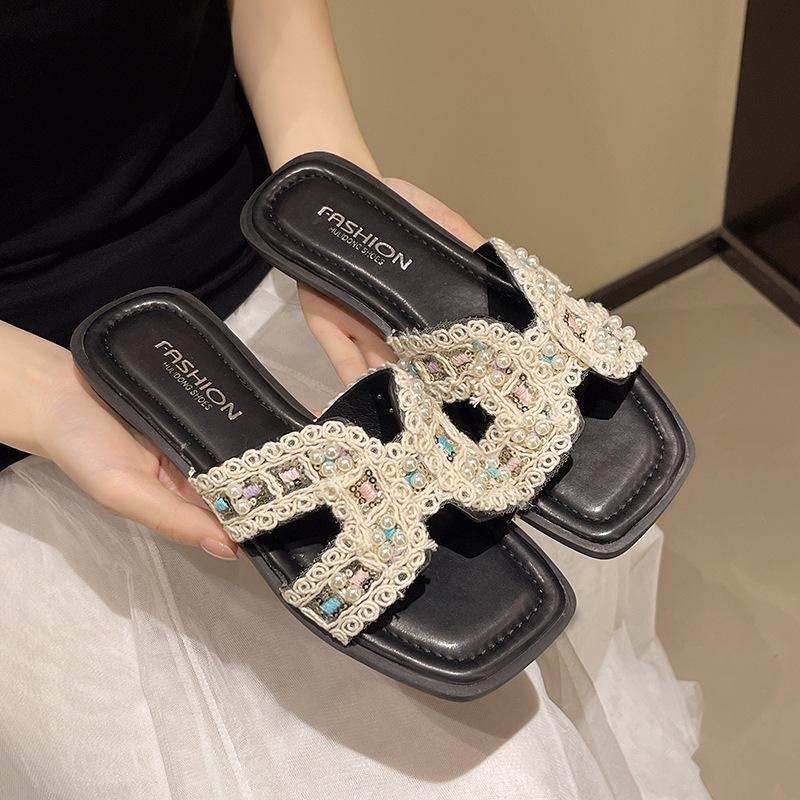 

Крутые тапочки женские для улицы 2025 лето новый нишевый дизайн приморские пляжные туфли тапочки на перемычке 40