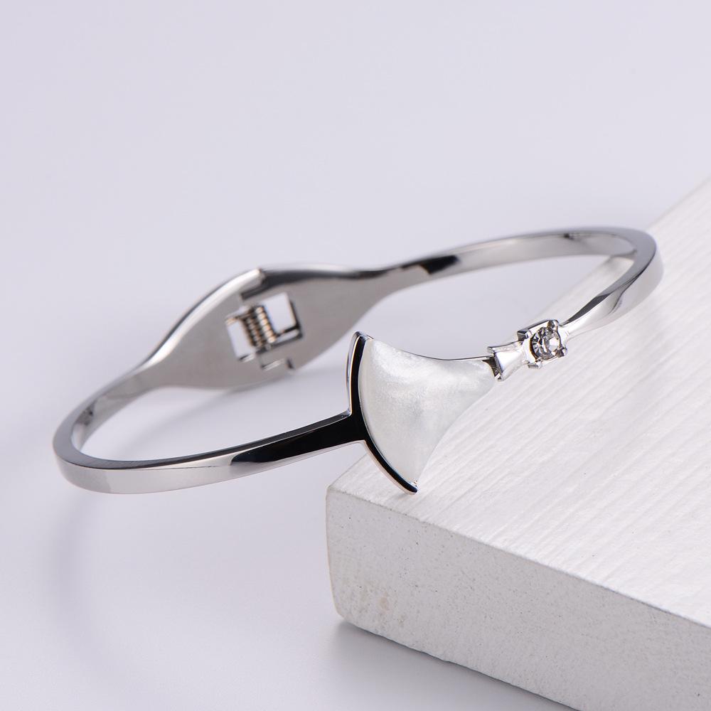 

AML Women s Stainless Steel Bangle Bracelet with White Mother-of-Pearl Christmas Design
