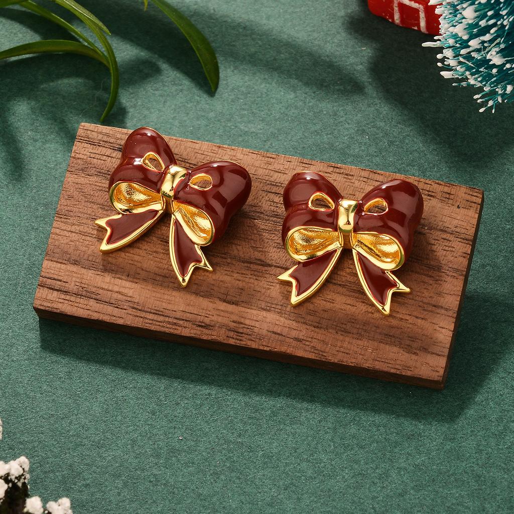 French bow New Year's pearl autumn and winter silver needle burgundy Christmas series earrings niche high-end personalized earrings