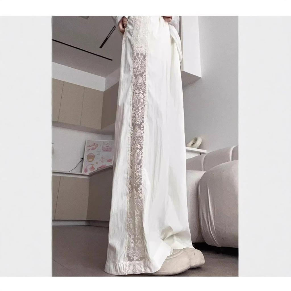 Pantaloni a gamba larga traforati con inserti in pizzo da donna estivi a vita alta con senso del design larghi sottili drappeggiati casual