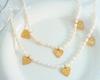 Retro Luxury Freshwater Pearl Necklace with Gold-Plated Titanium Steel Peach Heart Pendant