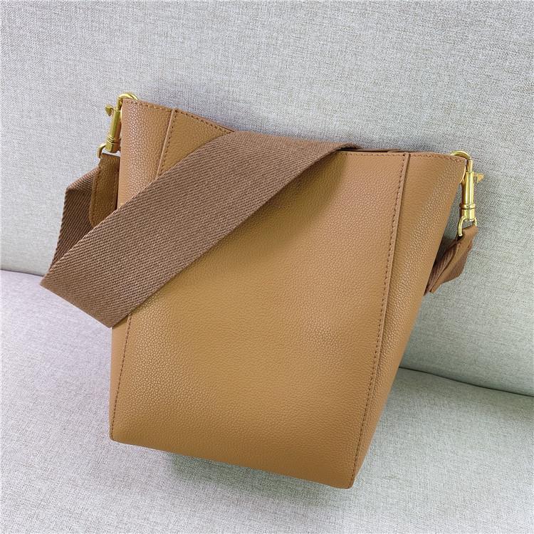 2023 New star with the same wide shoulder strap sangle bucket bag single shoulder oblique span leather women's bag simple child and mother bag