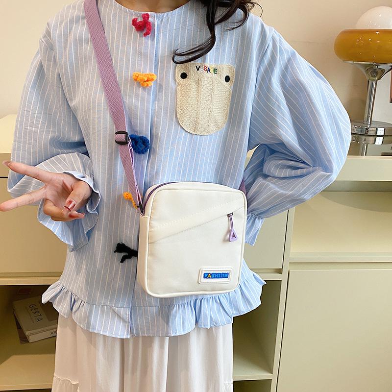 2025 street trend small satchel women's fashion casual composite cloth out of the street contrasting color shoulder small square bag