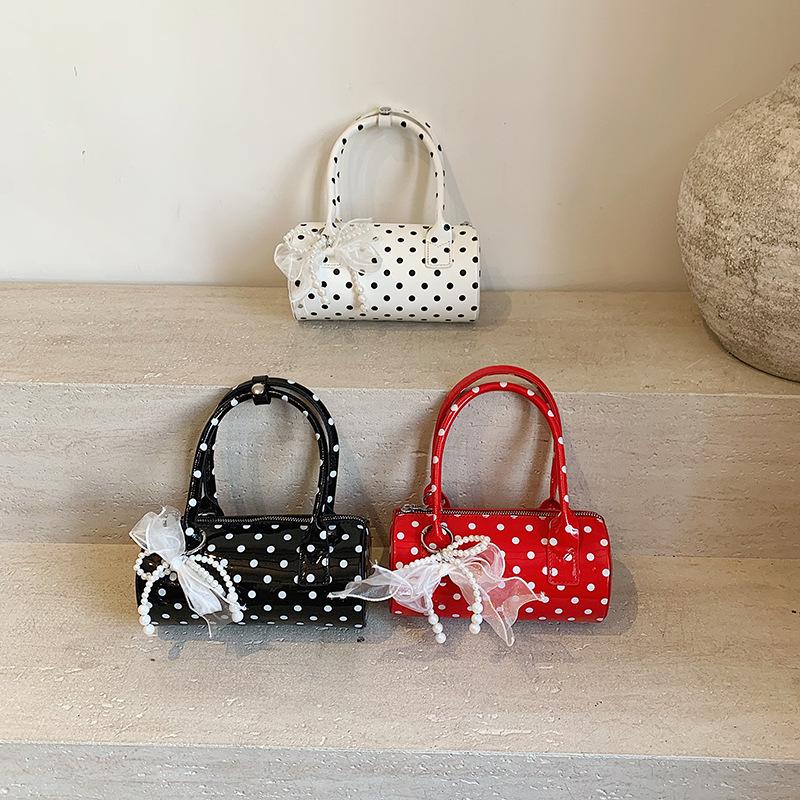 Niche polka dot bag 2025 new Mori sweet fashion bow foreign style versatile portable shoulder cylinder bag
