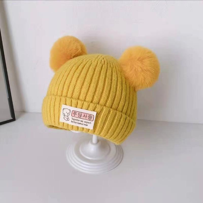 Baby autumn and winter cute cartoon warm hairball wool hat boys and girls baby ear protection hat children pullover knitted hat