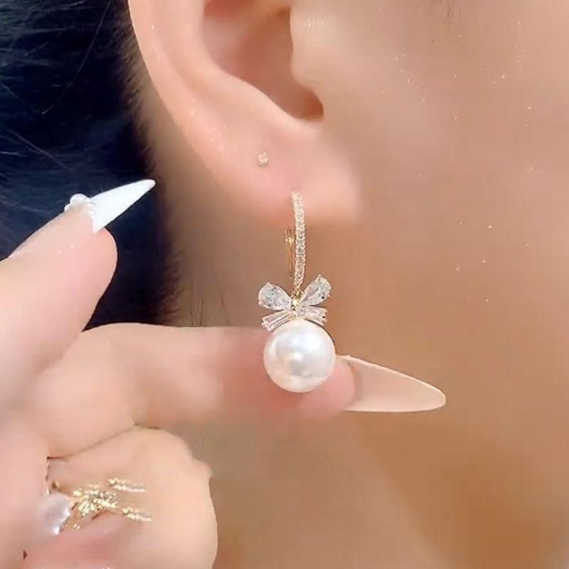 Temperament Bow Pearl Ear Buttons Light Luxury Sense of Senior Sense of Popular Earrings Temperament Hundred with The Fashionable Earrings