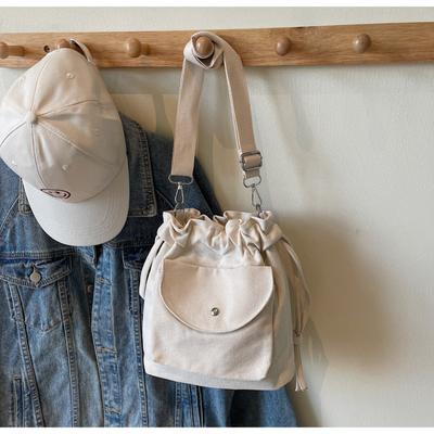 Canvas Bag Women's Spring and Summer New Niche Drawstring Shoulder Messenger Bag Pleated Bucket Bag