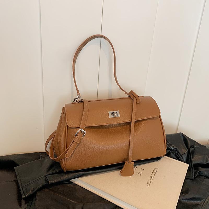Autumn new style fashion lock locomotive bag portable shoulder oblique span women's bag