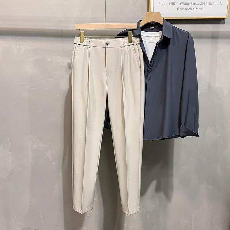 

Мужские универсальные эластичные брюки облегающего кроя - деловой кэжуал и трендовый летний стиль 34