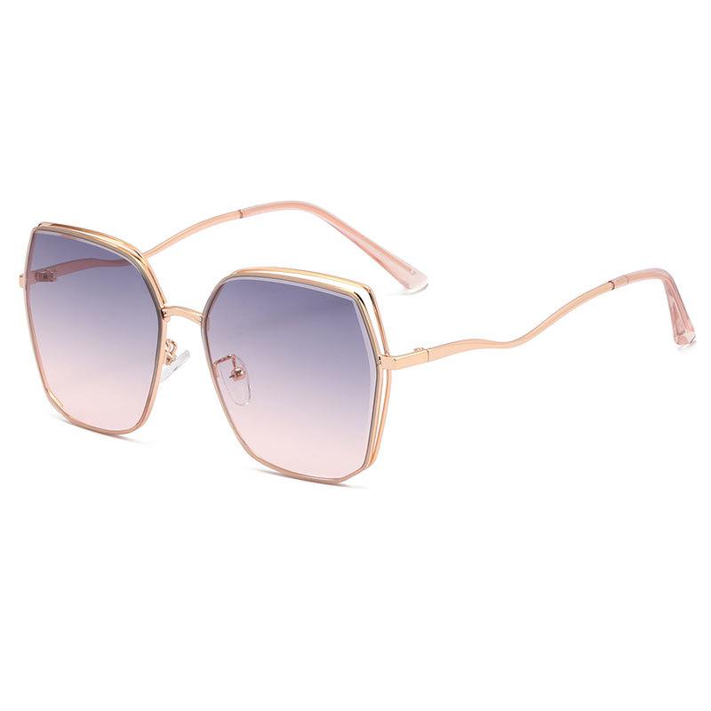 

New metal full frame personalized driving cycling sunglasses travel hollow frame sunglasses light color film