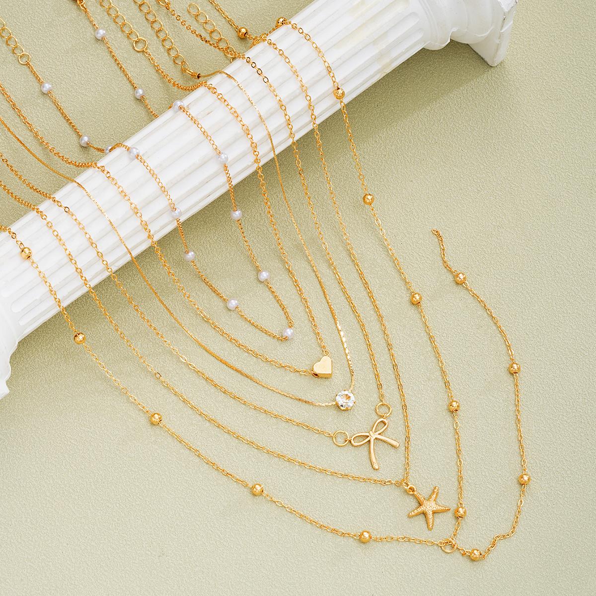 

6Pcs/Set Simple Stackable Gold Color Necklaces Sets for Women Heart Star Bowknot Imitation Pearl Crystal Necklaces Party Jewelry