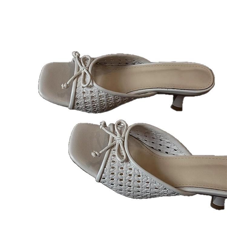 Sheepskin version~ Holiday style woven hollow sandals women's versatile bows one-word drag open-toed square head high heels summer