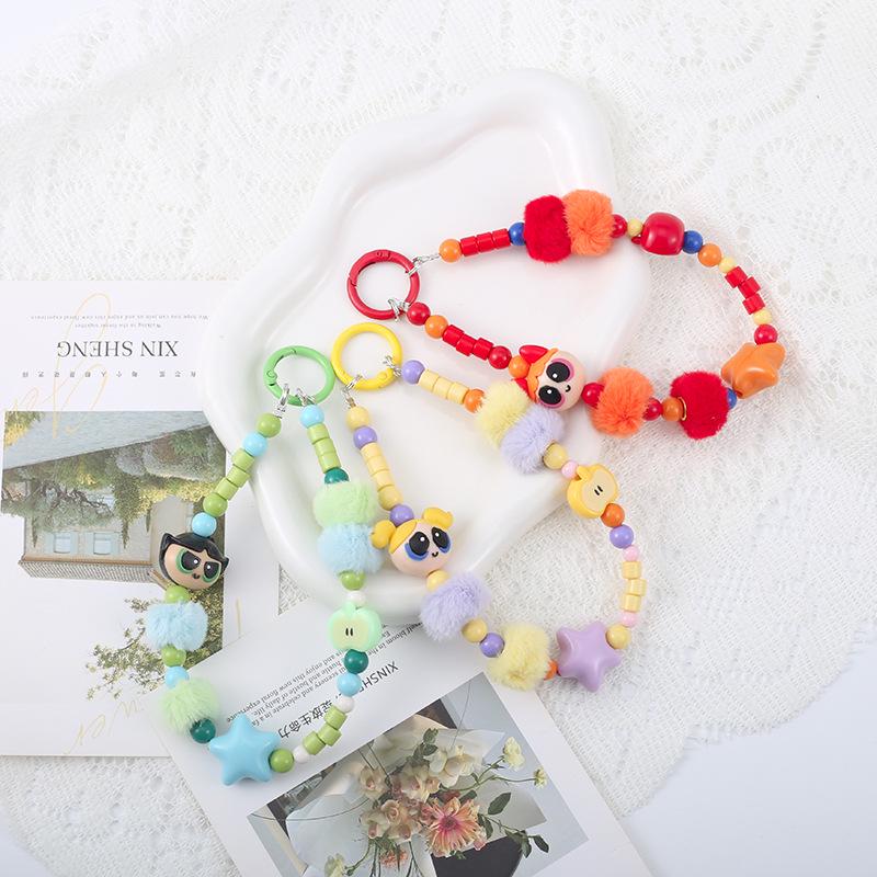 Flying Police Officer Doll Keychain with Bead Pom-Pom - Handmade and Cute Pendant for Bags or Phones