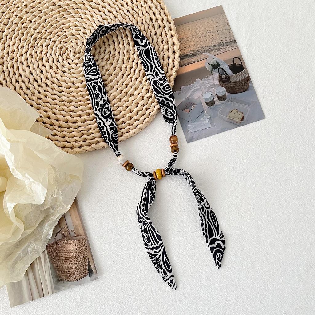 Korean version of versatile classic leopard print beaded silk scarf women's summer decoration long strip small scarf adjustable thin scarf