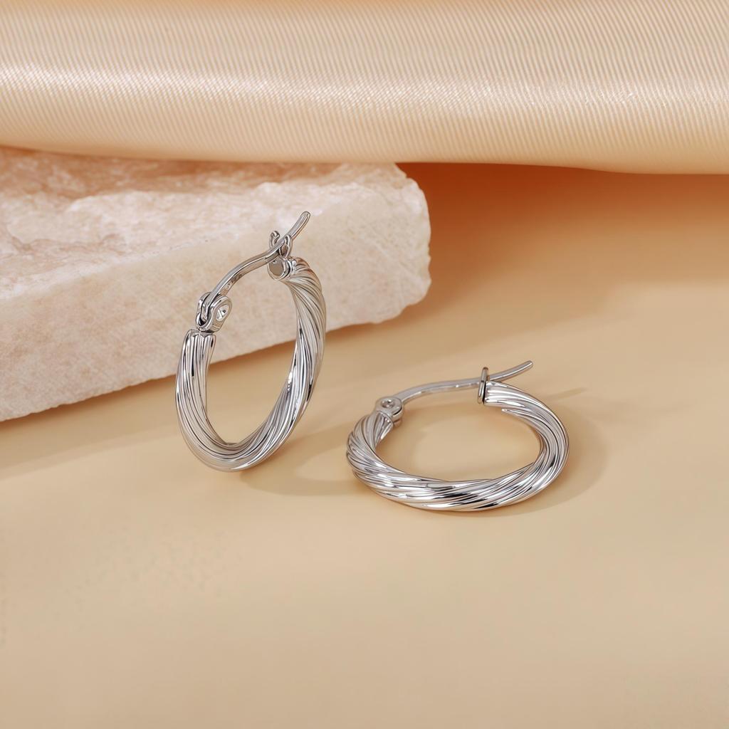 2025 Elegant Titanium Steel Needle-Woven Hoop Earrings - High-End, Colorfast Design for Women