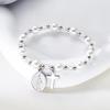 Elegante Bracciale con Crocifisso e Perle, dal Design Unico con Ciondolo in Lega per un Look Raffinato in Diverse Occasioni