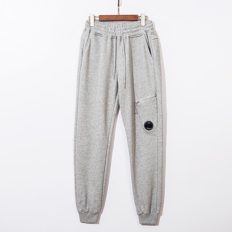 

Функциональные однотонные спортивные штаны унисекс с карманами на молнии L серый