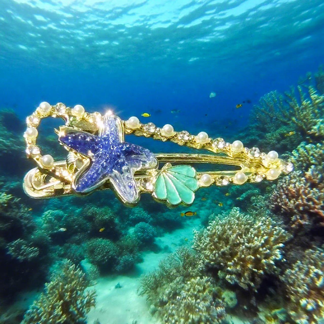 

Ocean Series Starfish Hair Clip: Fairy-Like High-End Hairpin for Side Bangs, Baby Hair, and Versatile Styling.