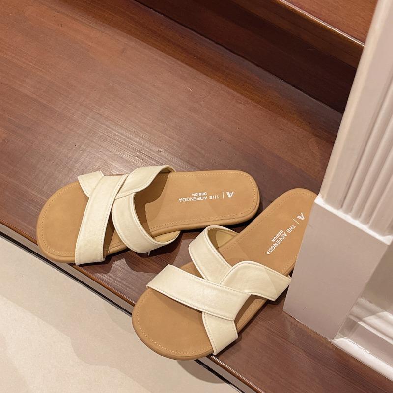 Pantoufles d'été pour femmes nouvelles sandales de plage plates à semelle souple haut de gamme mode sandales à une bride