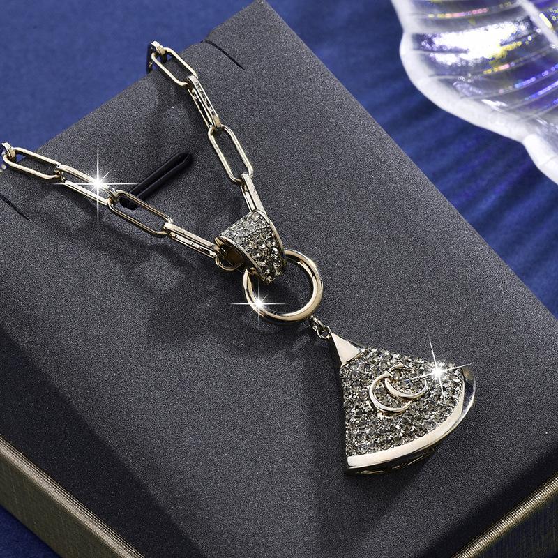 

Stylish Titanium Steel Necklace Featuring Rhinestone Skirt Charm And Chic Geometric Shape Coffee Gold