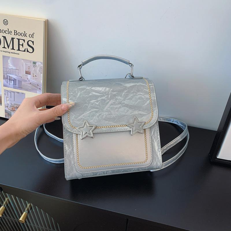 High-value small bag women's 2025 new backpack, portable student schoolbag, fashionable going out backpack