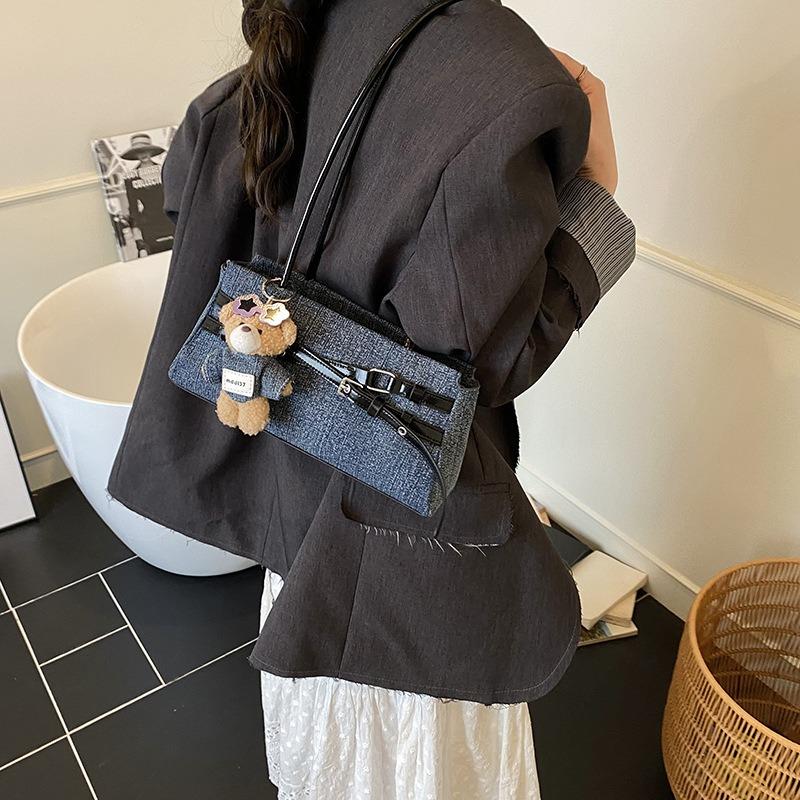 Nischen-Denimtasche Damen neue kontrastfarbene vielseitige Schulter-Unterarmtasche Pendler tragbare Baguettetasche