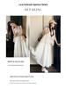 Trendy White Hollow Camisole Dress Set: Flattering Two-Piece Layered Vest & Dress
