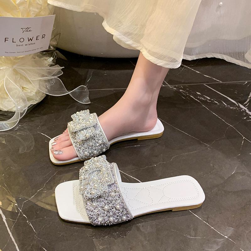 Internet celebrity slippers women wear 2025 summer new rhinestone bow large size beach with skirt one word cool slippers