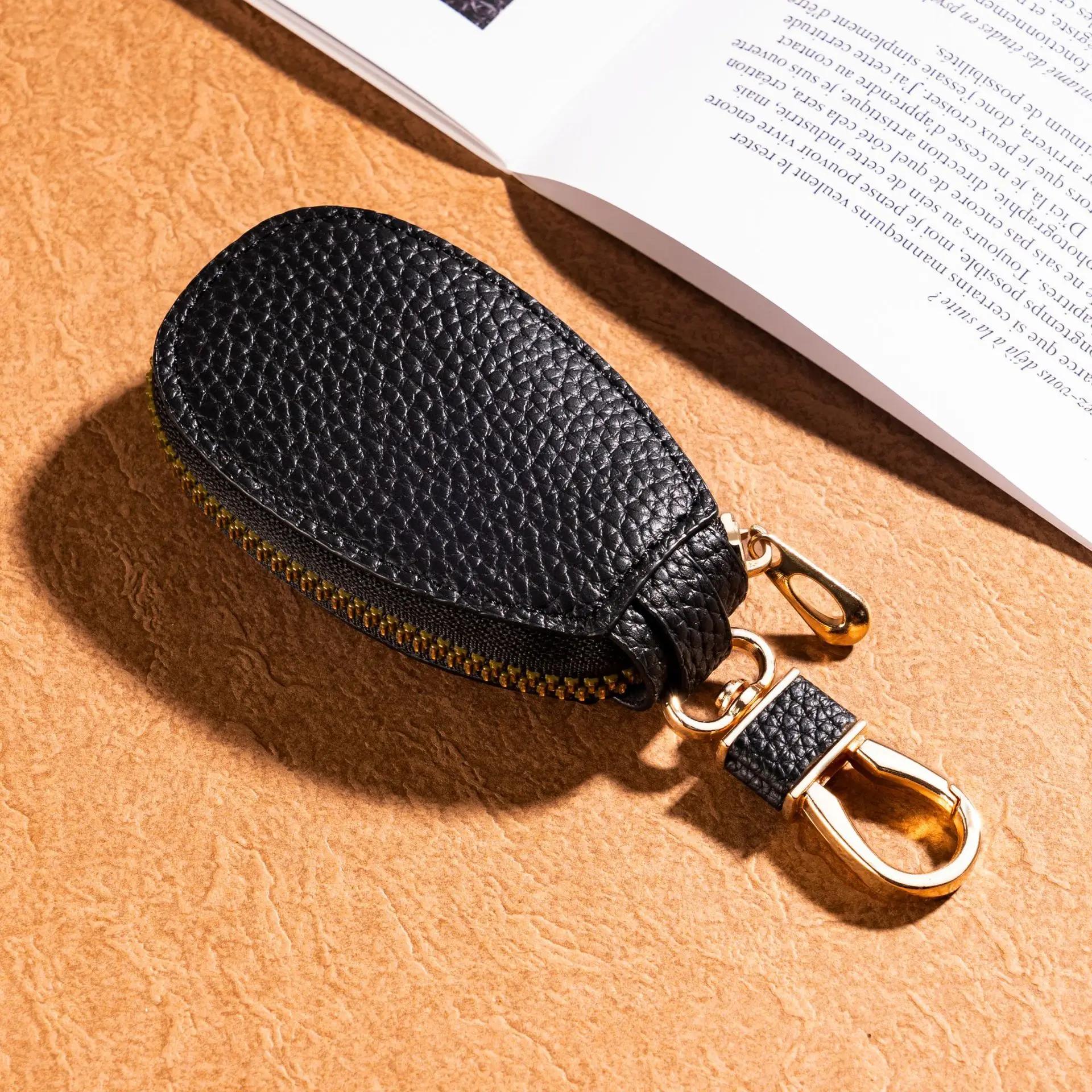 

Portable Waterproof Car Key Bag Auto Universal Solid Color PU Leather Case Zipper Multi-function Coin Purse Key Protective Cover чорний