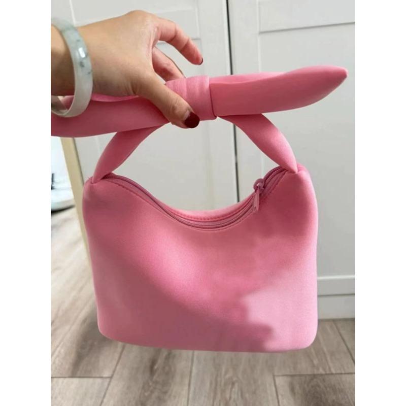 

Retro red bow handbag women s early spring new product concave shape decorative handbag casual cloud bag рожевий