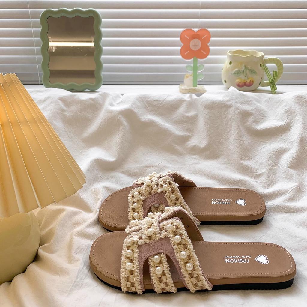 Seaside vacation cool slippers women's summer wear new casual flat bottom versatile with skirt one-word drag