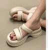 Muffin thick-soled heightening slippers women's summer wear 2025 new Internet celebrity fashion niche high-end sandals drag