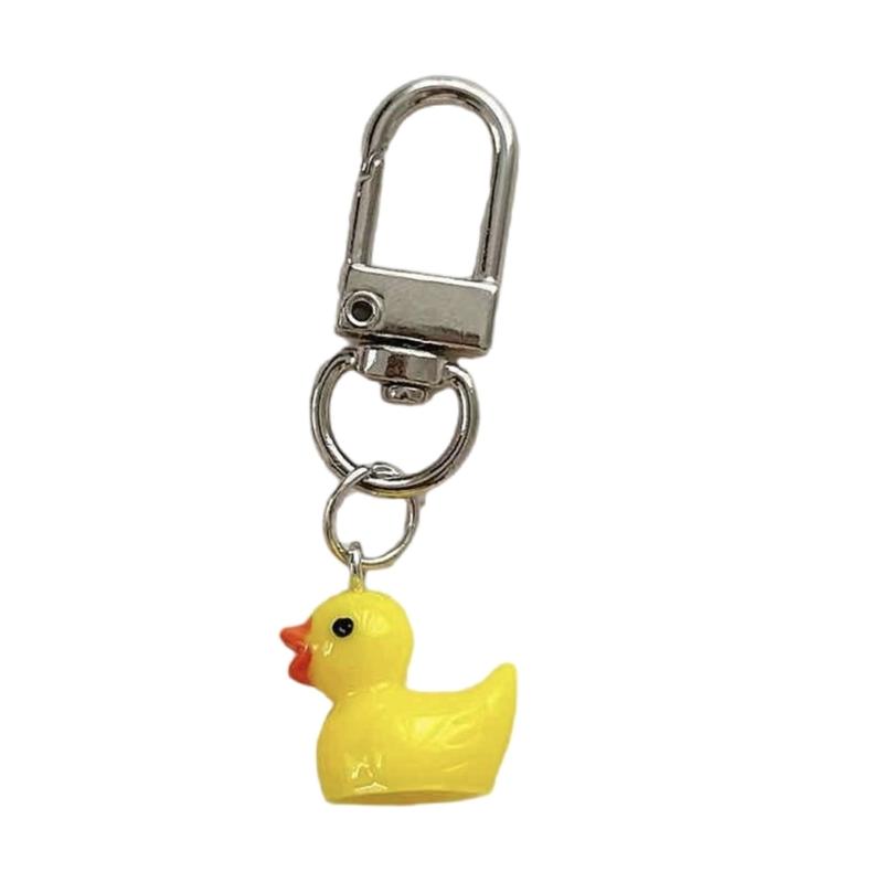 Gelbe Ente Handy-Anhänger Harzgefertigter Tier-Schlüsselanhänger Taschenanhänger Tragbares Mode-Rucksack-Accessoire für Frauen