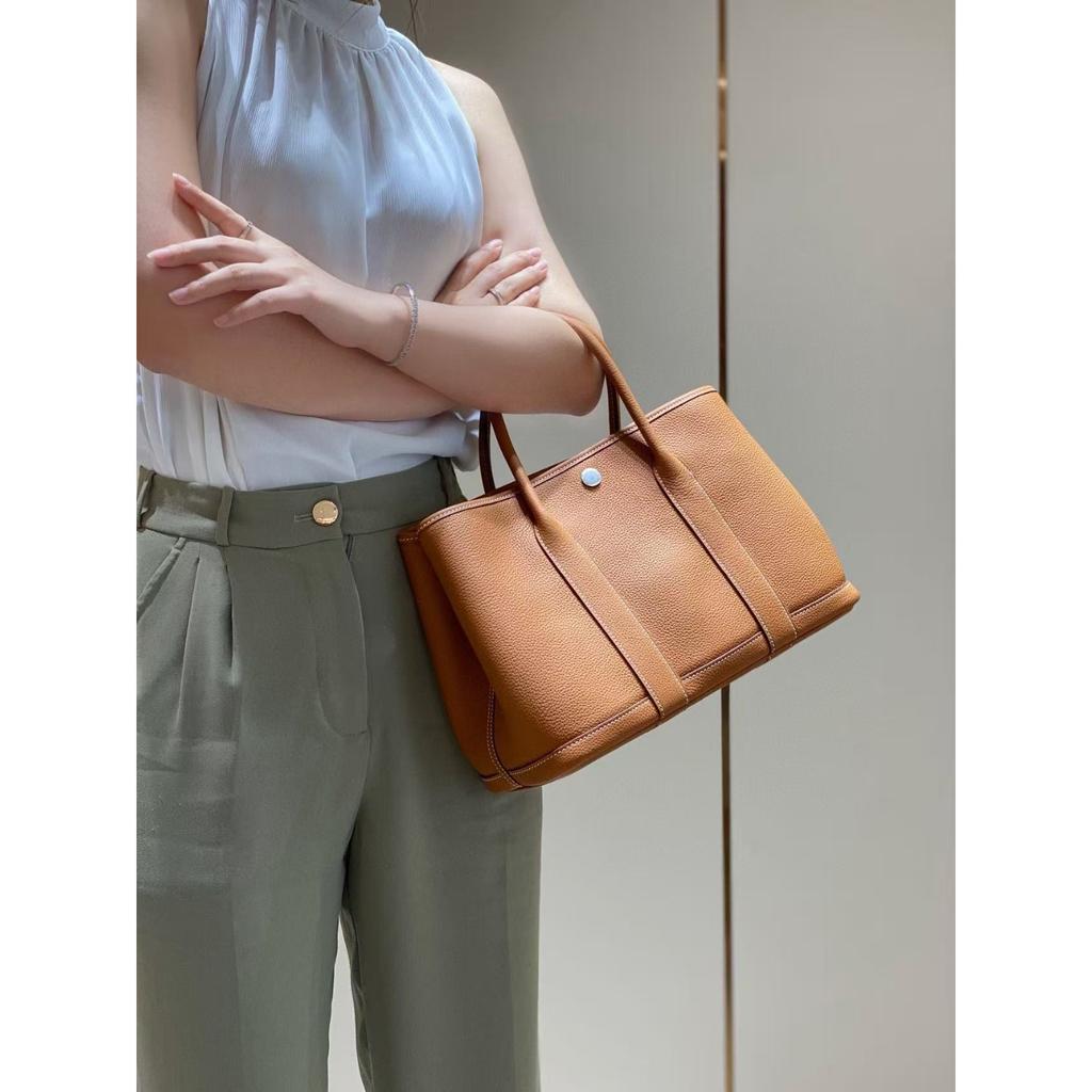 Borsa da giardino cucita a mano con filo cerato, ferramenta interamente in acciaio, borsa da donna portatile in pelle bovina primo strato con motivo a collo di mucca Ntogo