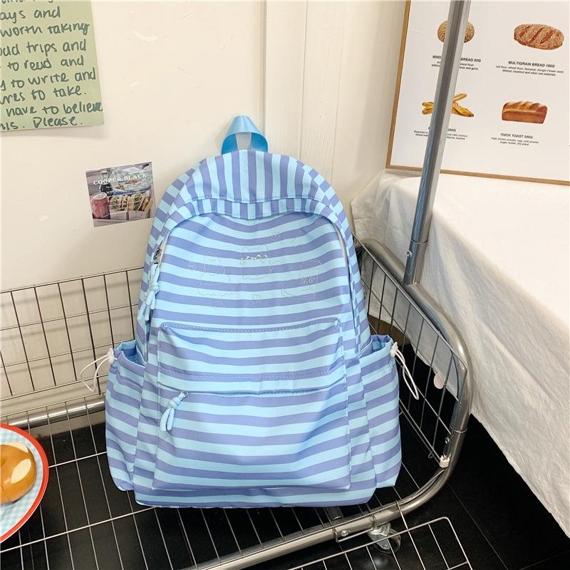 The New Schoolbag Is High-value, Fresh and Sweet, Striped Backpack, Lightweight and Large-capacity Backpack for Junior and High School Students.