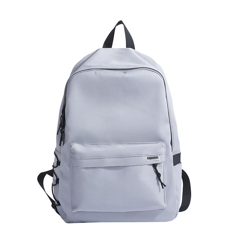 New junior high school primary school students schoolbag large capacity lightweight backpack girl simple leisure travel backpack tide