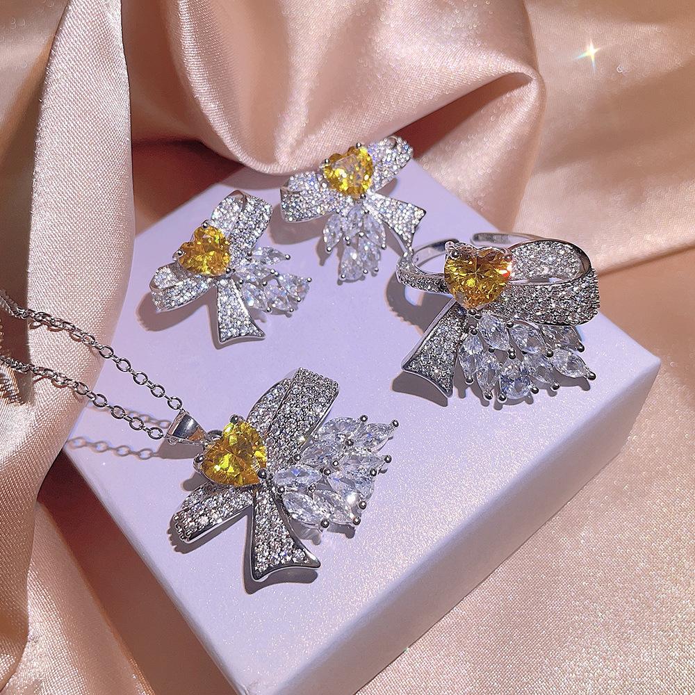 Deluxe Women's Jewelry Three-piece Set with Yellow Love Zircon Bow Ring Earrings Necklace