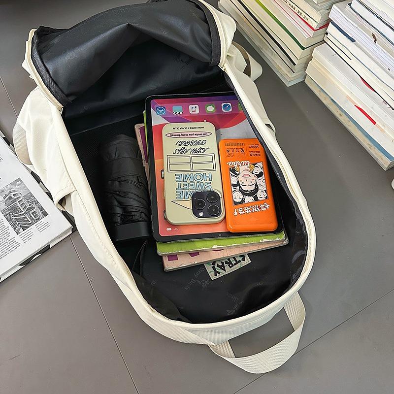 Solid color high-end backpack junior high school students casual simple travel large-capacity backpack