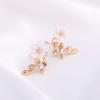 Korean Needle Earrings, White Flower Rear-Hanging Stud Earrings, High-End Alloy Jewelry.